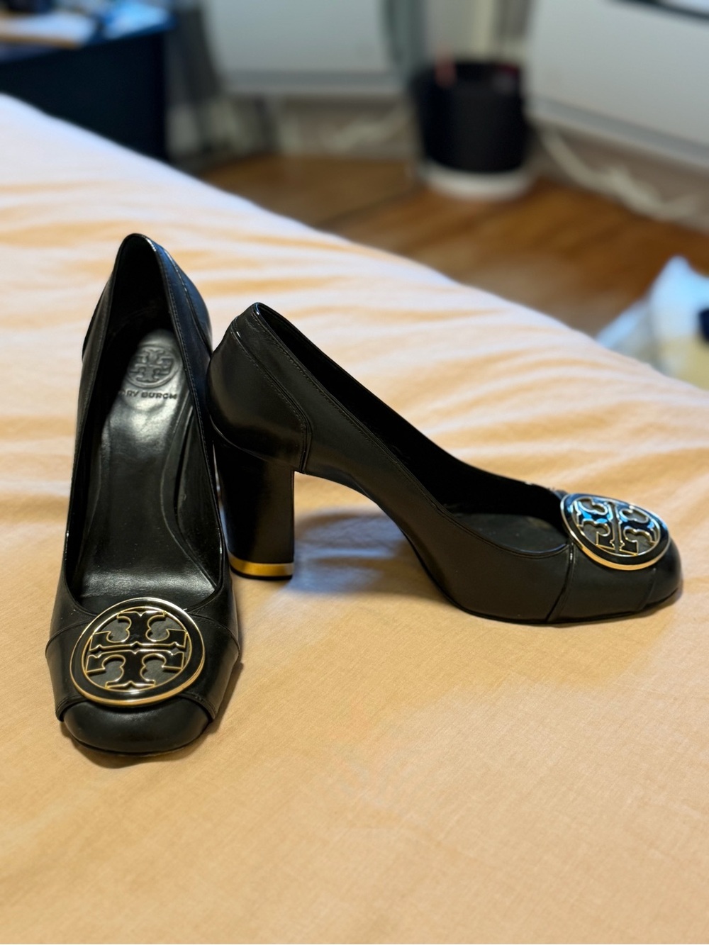 Tory Burch Black Leather Block Heel Pumps with Gold Logo Accent